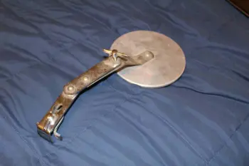 Rim mounted bass drum muffler