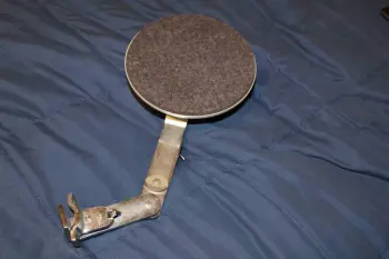 Rim mounted bass drum muffler
