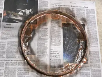 Removing old paint from wooden hoops...