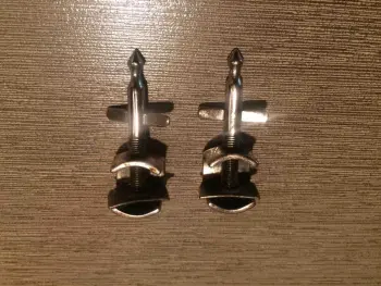 Short clamp on bass drum spurs