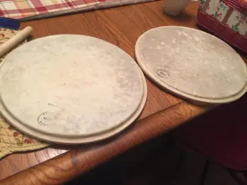 Genuine skin drum head:  How to restore?