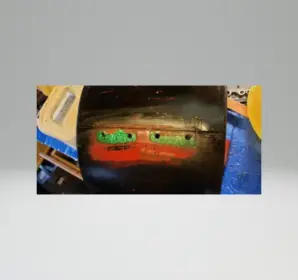 Removing paint without damaging wrap?