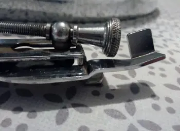 A bent p83 strainer lever