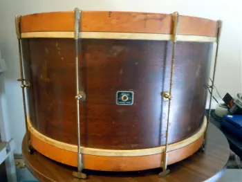 Creating a collar with calf heads on single tension drums...