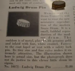 1933 Ludwig &amp; Ludwig gold/white enamel lapel pin
