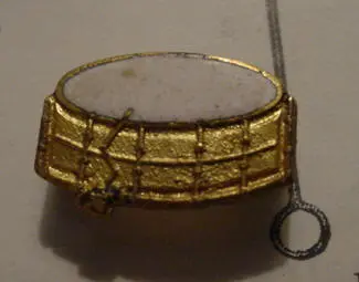 1933 Ludwig &amp; Ludwig gold/white enamel lapel pin