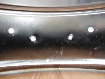 1989 Supra shell drilled holes.