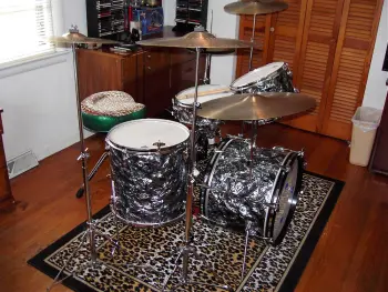 Anyone know what spurs fit these holes in 1965 Slingerland kick? (pics included)