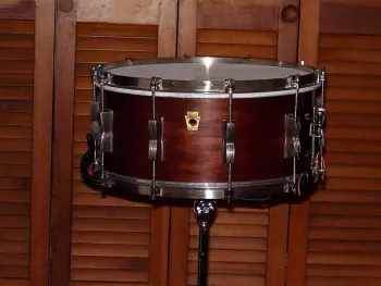 What is the definition of a real drum builder as opposed to a Drum assembler?
