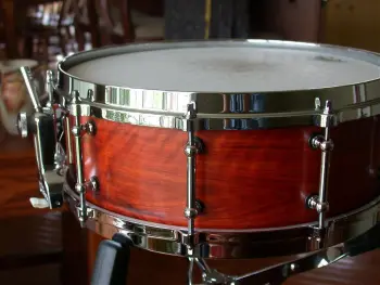 What is the definition of a real drum builder as opposed to a Drum assembler?