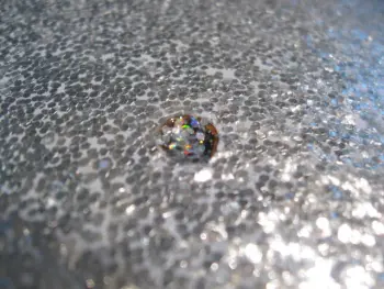 Filling holes with the original sparkle wrap.