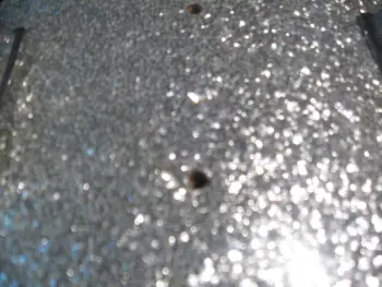 Filling holes with the original sparkle wrap.