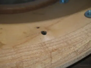 Repairing a dent in a drum