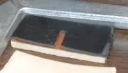 Repairing a dent in a drum