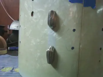 Drilling new holes.