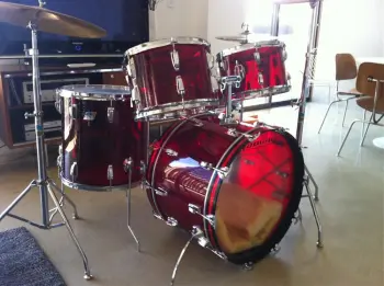 Red Ludwig Vistalite with matching snare.