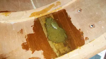 Hillbilly repairs on a wrecked bass drum