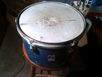 Pair of old drums in less than perfect shape