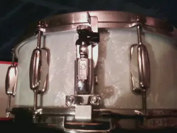 Opinions needed on changing a vintage snare throw-off