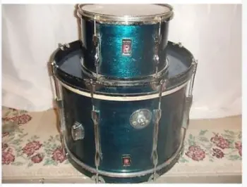 Please help identify the shell material on these Olympic By Premier drums