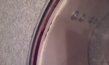 Chunk out of Ludwig Rocker bearing edge