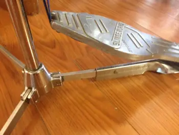 Vintage Hi-hats with foot board over one of the legs