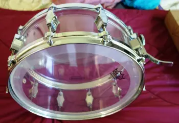 Before and after of Fibes crystalite snare.
