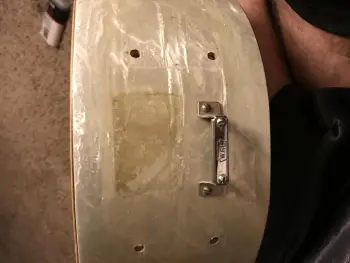 How do I remove sticker residue from WMP?