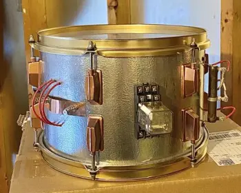 Staining and/or sealing stripped drum shells