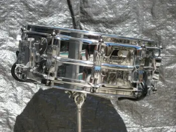 Rocker metal snare