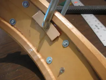 Repairing a dent in a drum