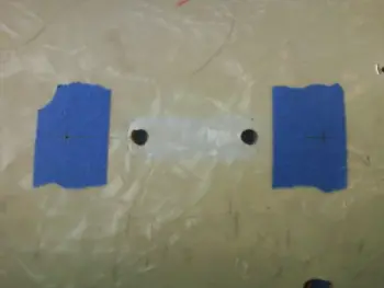 Drilling new holes.