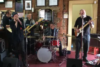 Slingys out at a gig