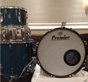 Please help identify the shell material on these Olympic By Premier drums