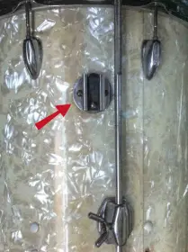 Star: function of clamp at the floor tom shell?
